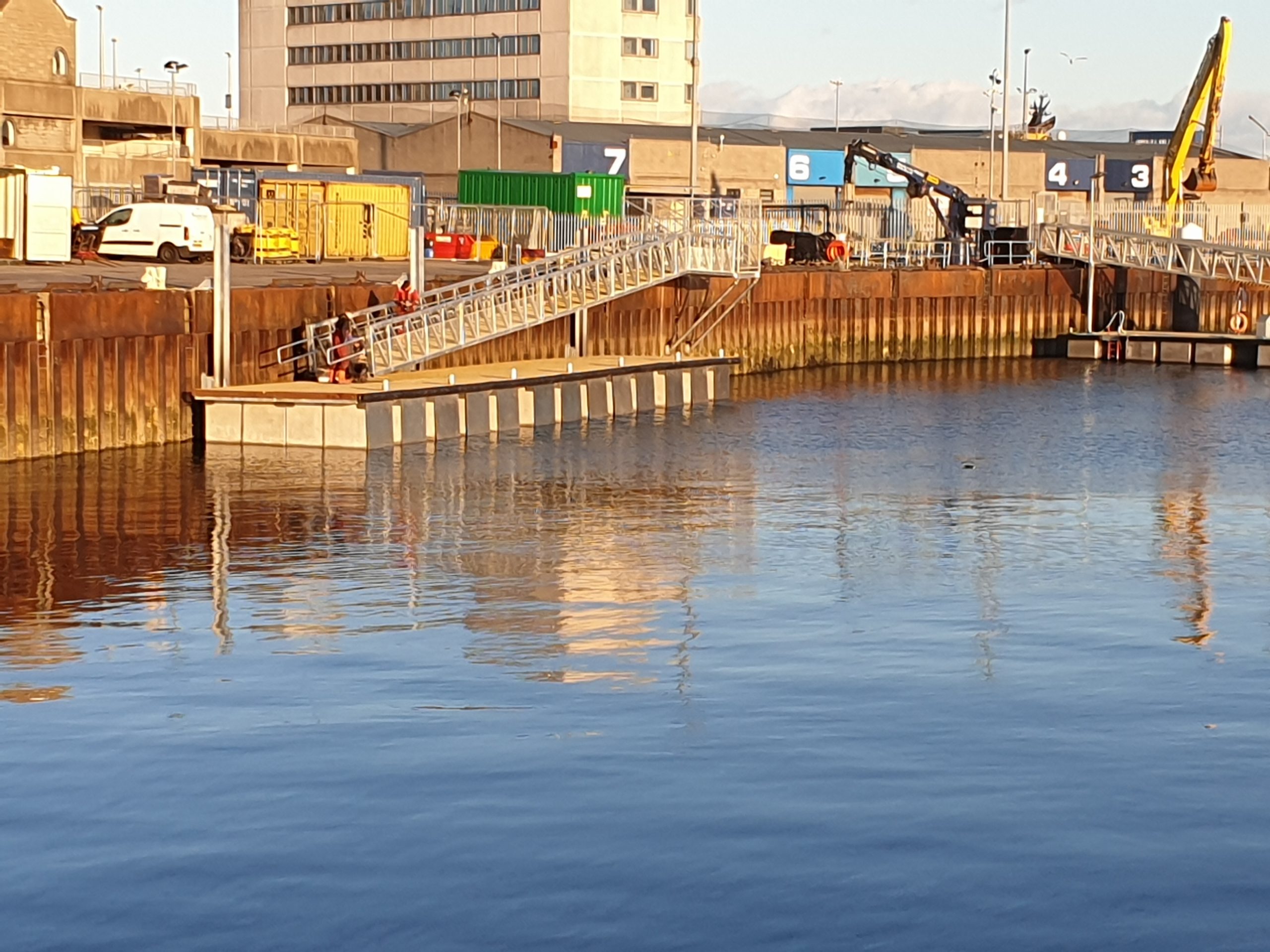 Crew transfer vessel berth attached to quay wall