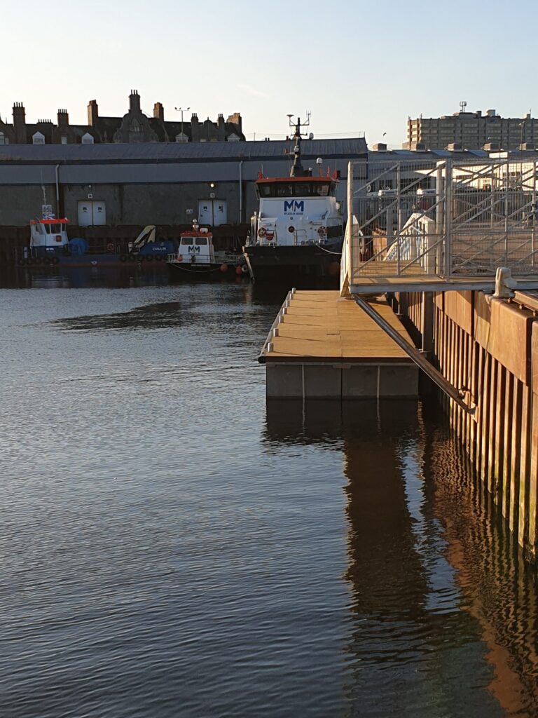 End view of a pontoon berth and gangway access