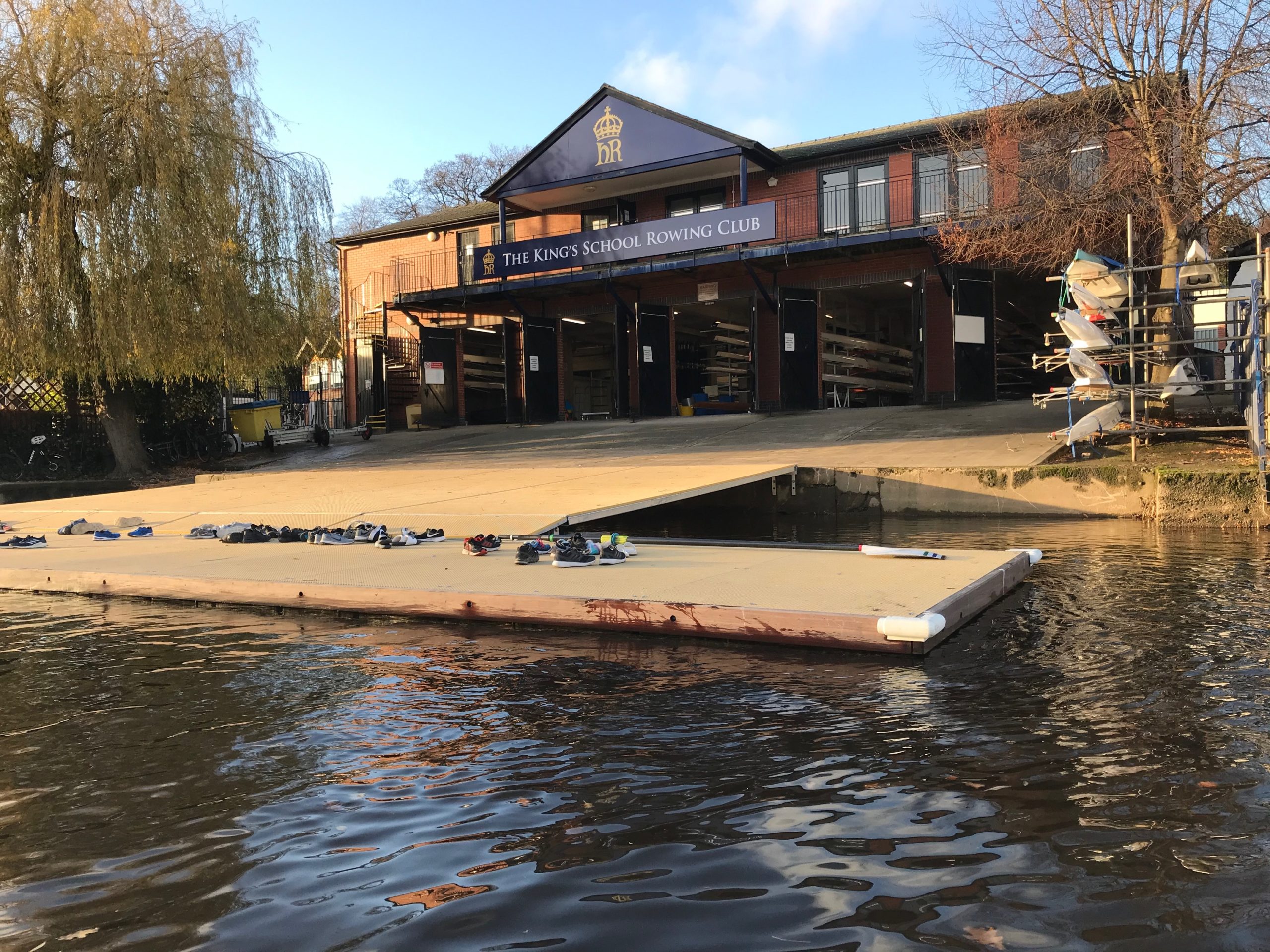Exterior of Kings School Rowing club with a view into the boat house