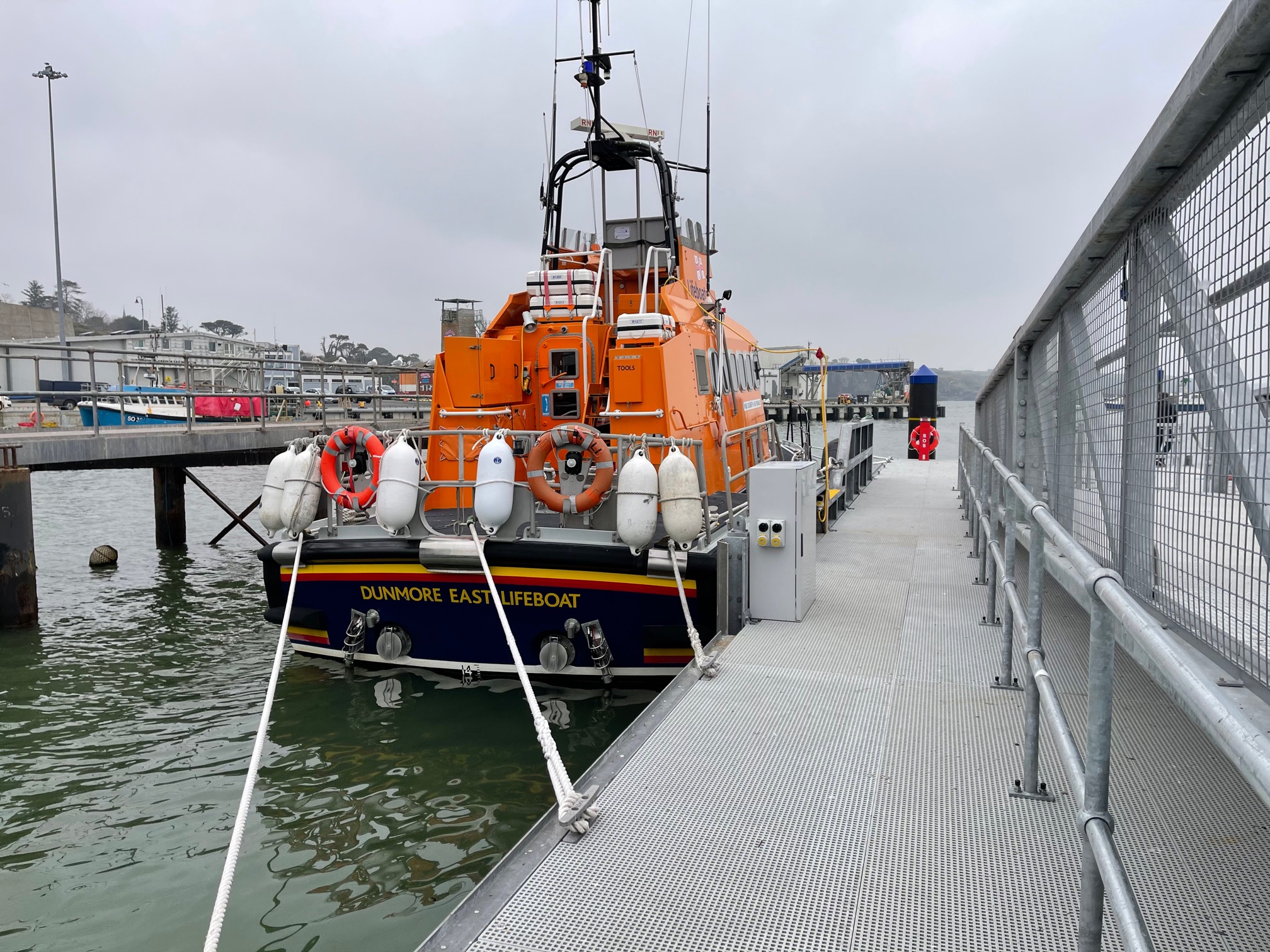 RNLI all-weather lifeboat moored to pontoon