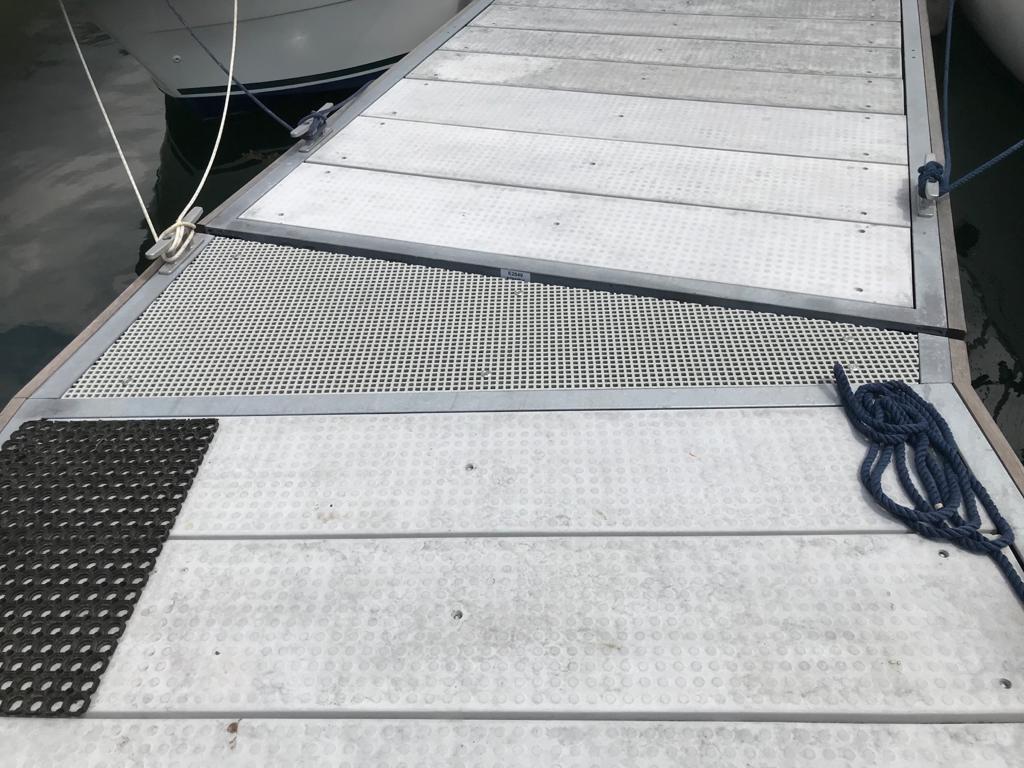 Grey GRC decked pontoon with connecting section