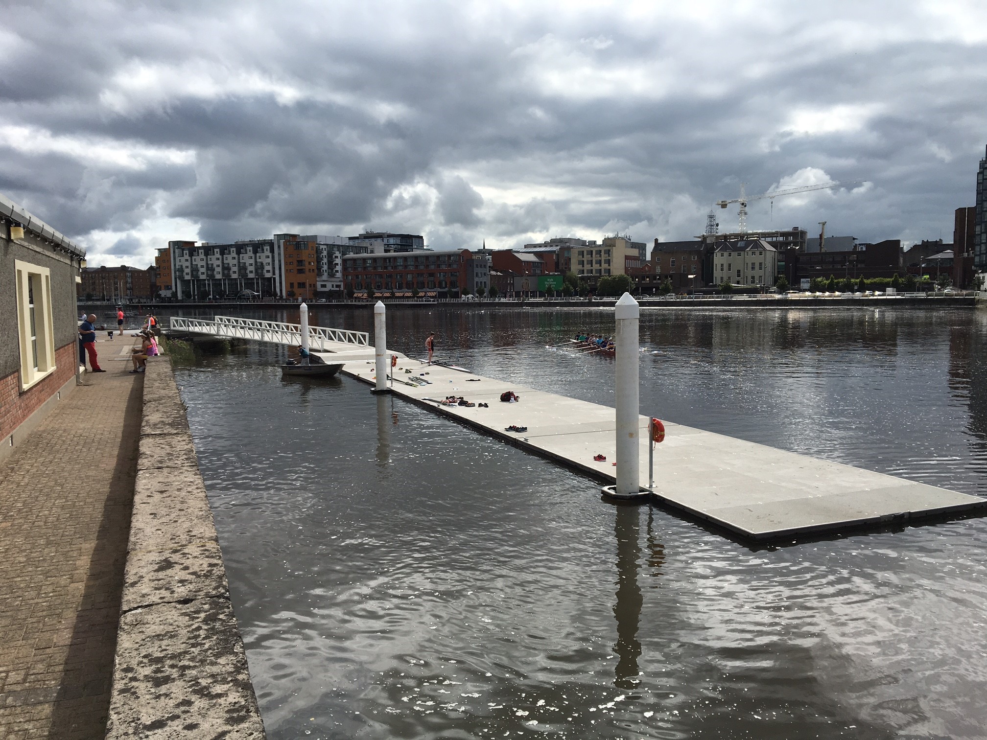 Riverside rowing pontoon moored on piles on the River Shannon