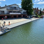 Floating low freeboard rowing pontoon outside Marlow Rowing Club