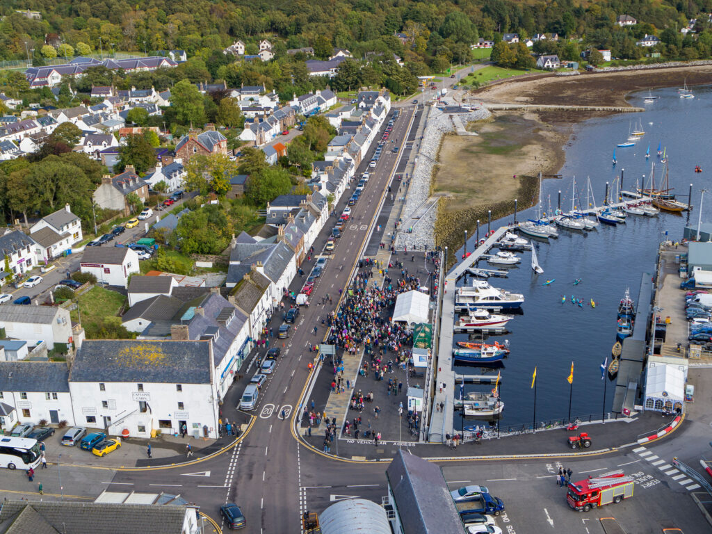 Aerial view of Ullapool Harbour opening day in Scotland