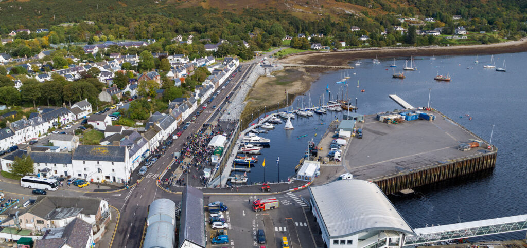 Aerial view of Ullapool Harbour opening day in Scotland
