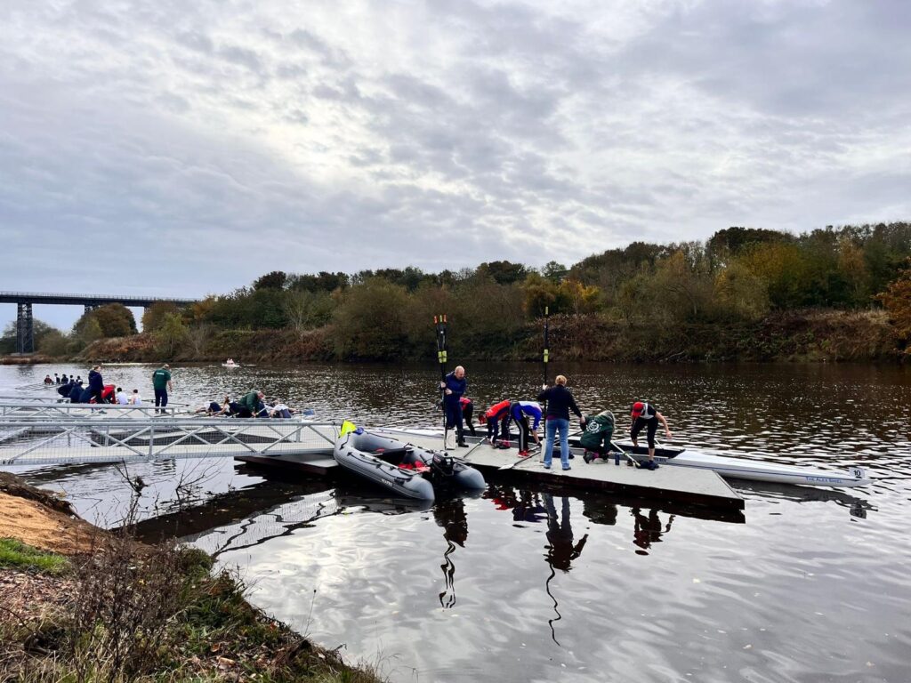 Rowers walking on he new pontoon at Cambois Rowing Club