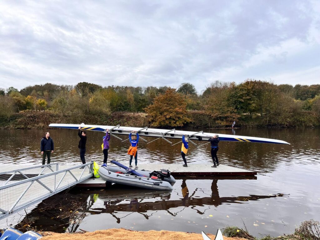 Rowers walking on he new pontoon at Cambois Rowing Club