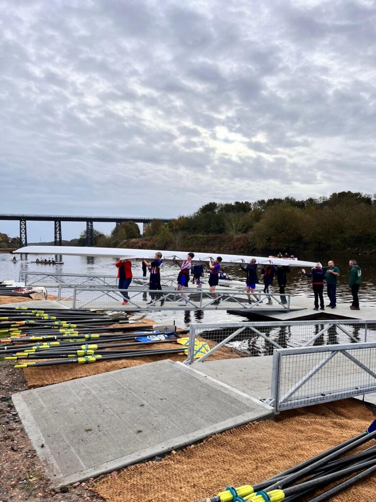 Rowers walking on he new pontoon at Cambois Rowing Club