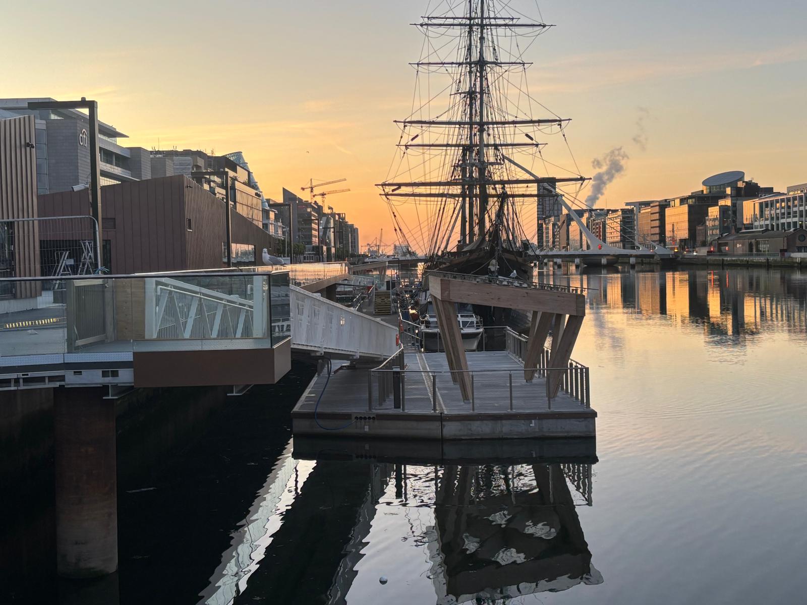 Jeanie Johnston in Dublin Dockyard at sunset alongside Inland and Coastal pontoon