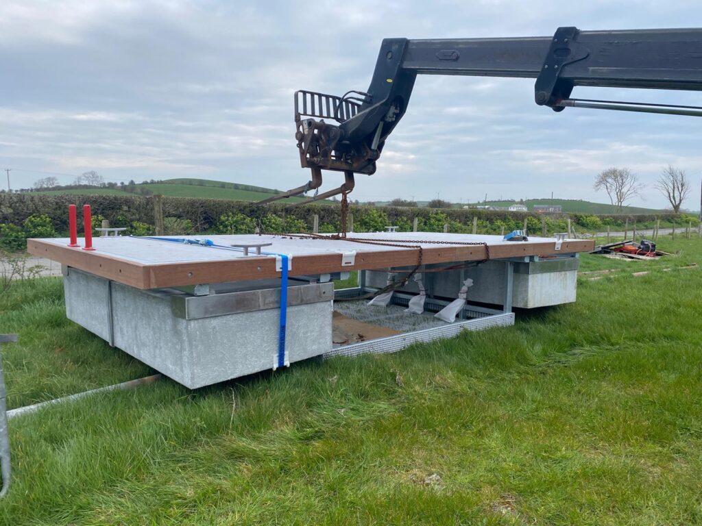 Redesigned leisure pontoon to include purpose-built basket underneath for oyster nursery at Glenarm Marina in Co.Antrim , Ireland